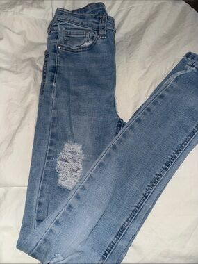 Light Blue Women’s Ripped Skinny Jeans